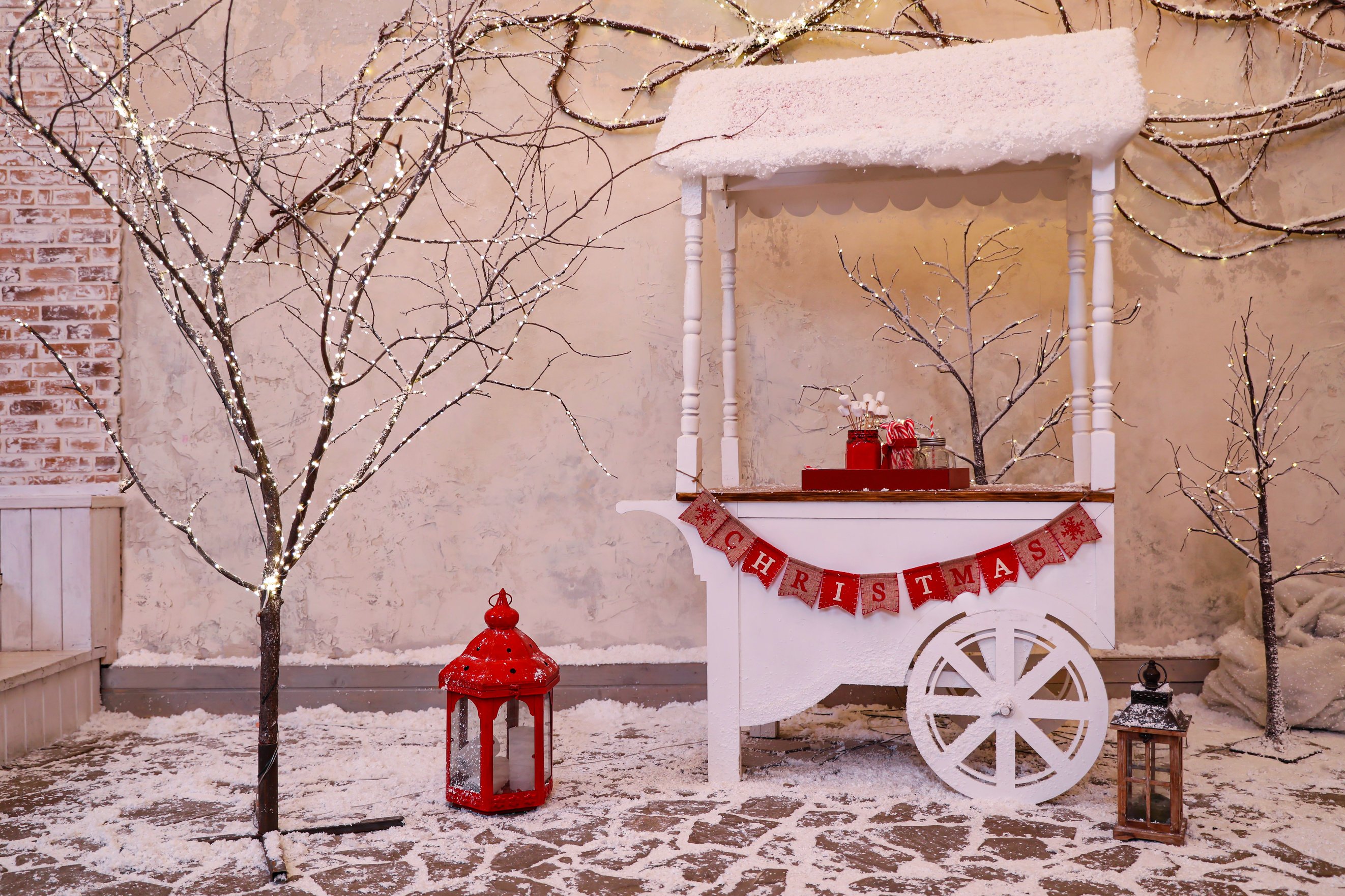 Candy Cart with Flag Garland on Street. Christmas Celebration